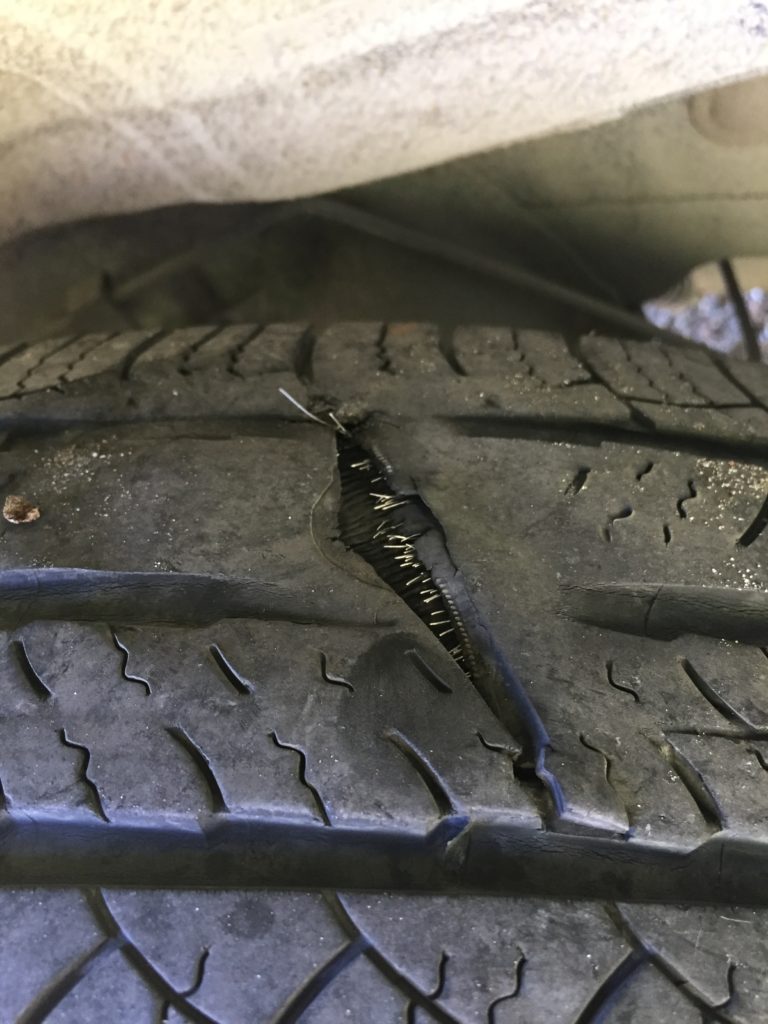 slashed tire on ford escape