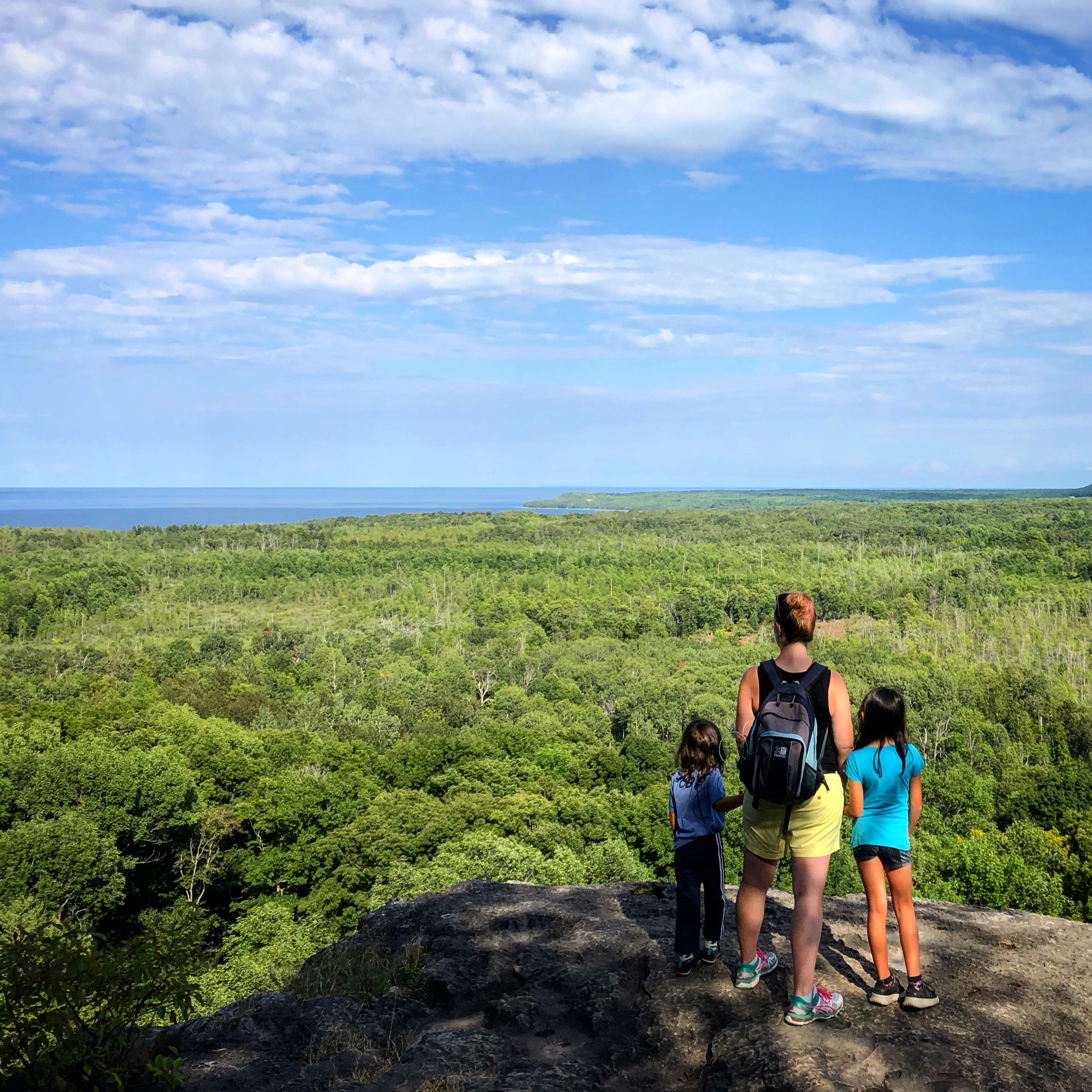 My and my kids on Skinner's Bluff look out #brucetrail #skinnersbluff #wiartonontario #epichikes #hikewithkids #takeyourkidseverywhere