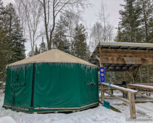 Green Ontario Parks yurt for winter camping at MacGregor Point Provincial Park #findyourselfhere #macgregorpointprovincialpark #macgregorpoint #macgregorpp #ontarioparks #yurtcamping #wintercamping #outdoors #adventureparenting #portelgin #brucepeninsula PHOTO BY kathryn dickson