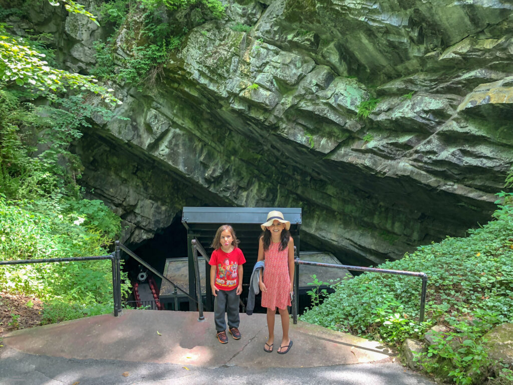Little Man and Miss M at the entrance to the cave in Penn's Cave, just outside of State College, PA.