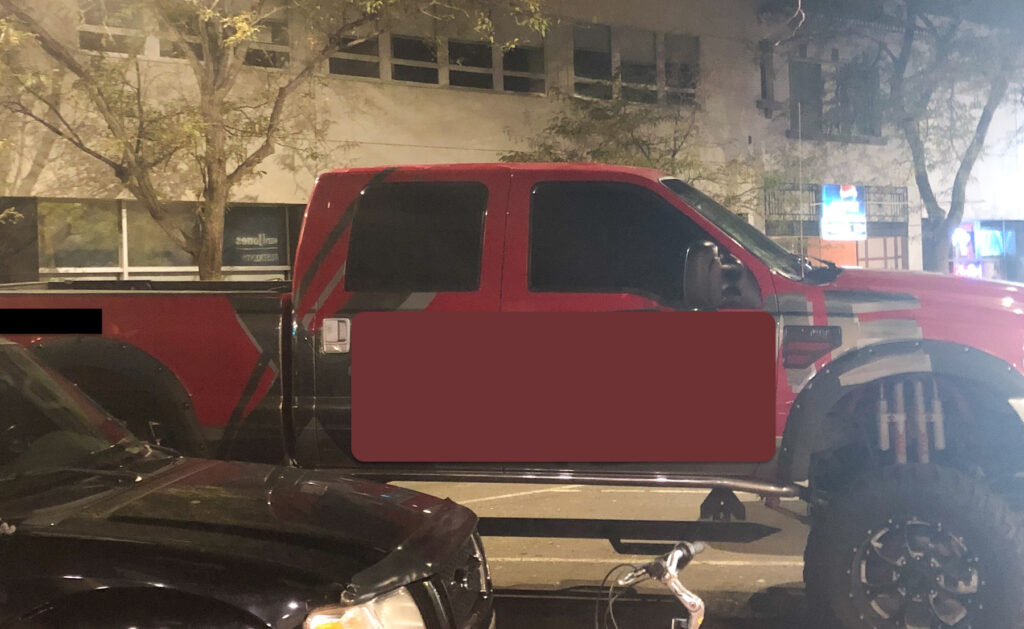The fuck boy truck, a big red monster truck