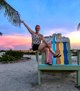 KathrynAnywhere in an oversized chair, very excited for a photos at Island Inn on Sanibel Island.