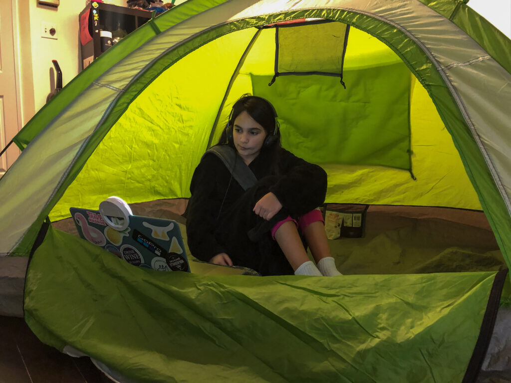 My daughter taking zoom calls in a tent in the living roomMy daughter taking zoom calls in a tent in the living room during the covid-19 pandemic