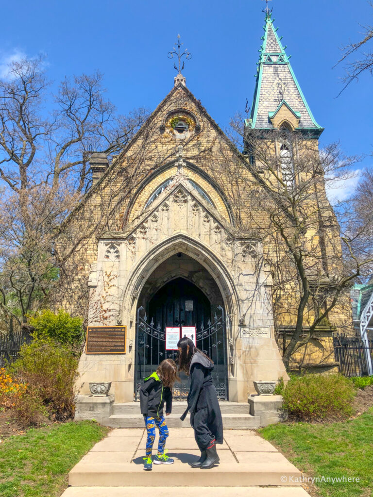 Necropolis Cemetery Gate in Toronto with children in front of it